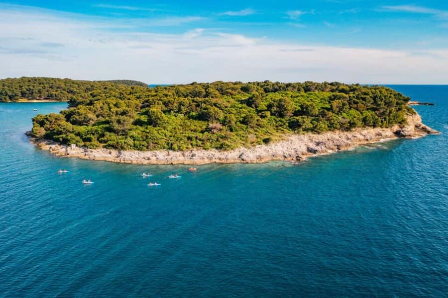 Pula: Three Island Kayak Tour with Cave Photo & Snorkeling - Fratarski island: beach time and a possible extra cave