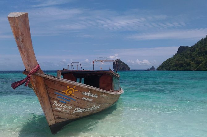 Railay and 4-Island Sunset Speedboat Cruise with Night Snorkel - Sunset snacks and the night swim