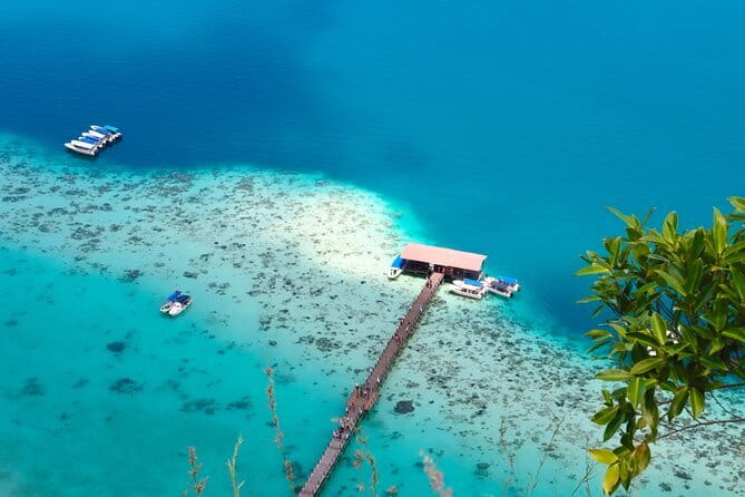 Semporna Hike Bohey 3 Island Snorkel Dive Tour and Lunch - Mantabuan pairs island history with clear water