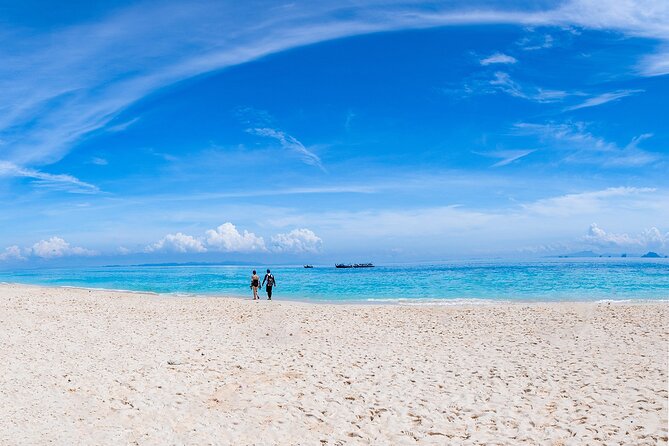 Snorkeling Phi Phi Islands Tour From Phi Phi by Speedboat - Viking Cave, Loh Samah Bay, and the limestone scenery