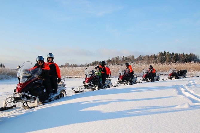 Snowmobile Safari in Helsinki Archipelago with Lunch - Ice fishing and kick sledding
