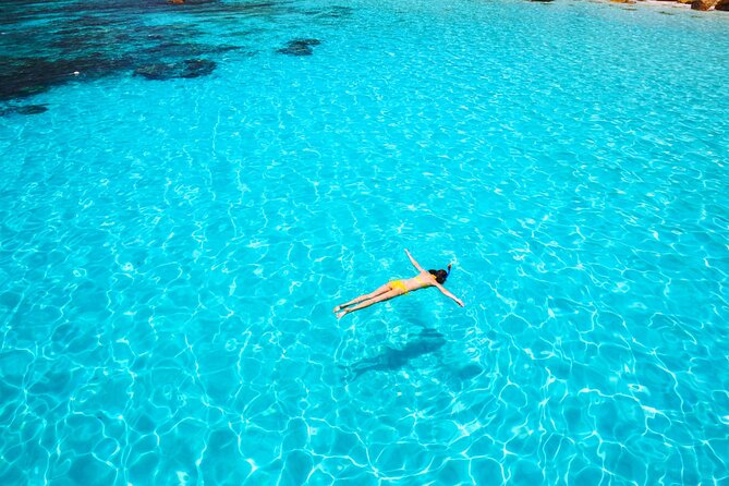Split: Blue Lagoon & 3 Islands Speedboat Tour - Small group - Blue Lagoon: clear water, rocky footing, and limited swim time