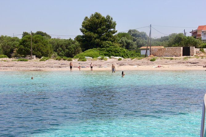 Three Islands Private Speedboat Tour With Blue Lagoon Stop - Drvenik Mali starts with a lighthouse and islet
