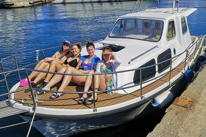 Visit 2 Islands of Zadar on a traditional wooden boat during half-day trip - Preko: beach time, cafés, and a short island walk