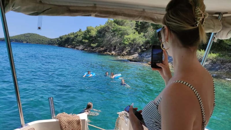 Zadar: Island-Hopping Blue Lagoon Boat Tour with Drink - What the skipper adds to the ride