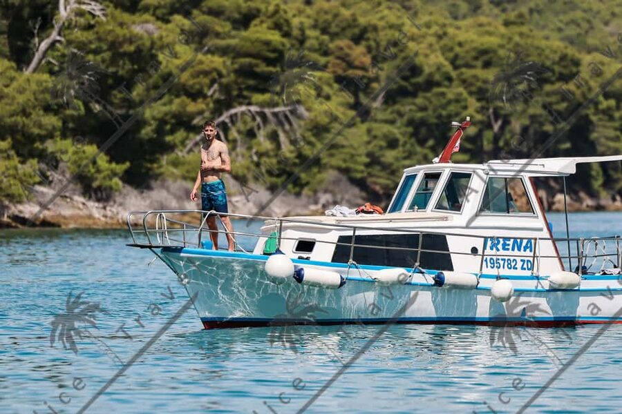 Zadar: Island Hopping Half-day Boat Tour with Snorkeling - Leaving Zadar by traditional boat