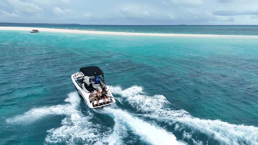 Zanzibar: Luxury Speedboat Island Hopping Tour - Prison Island combines old ruins with giant tortoises